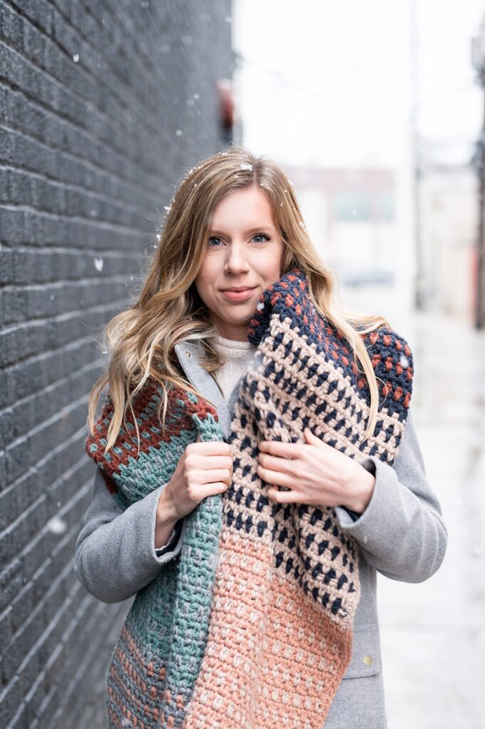 Make Nine 2022: Image of female modelling the Make a Statement Scarf by Woods & Wool
